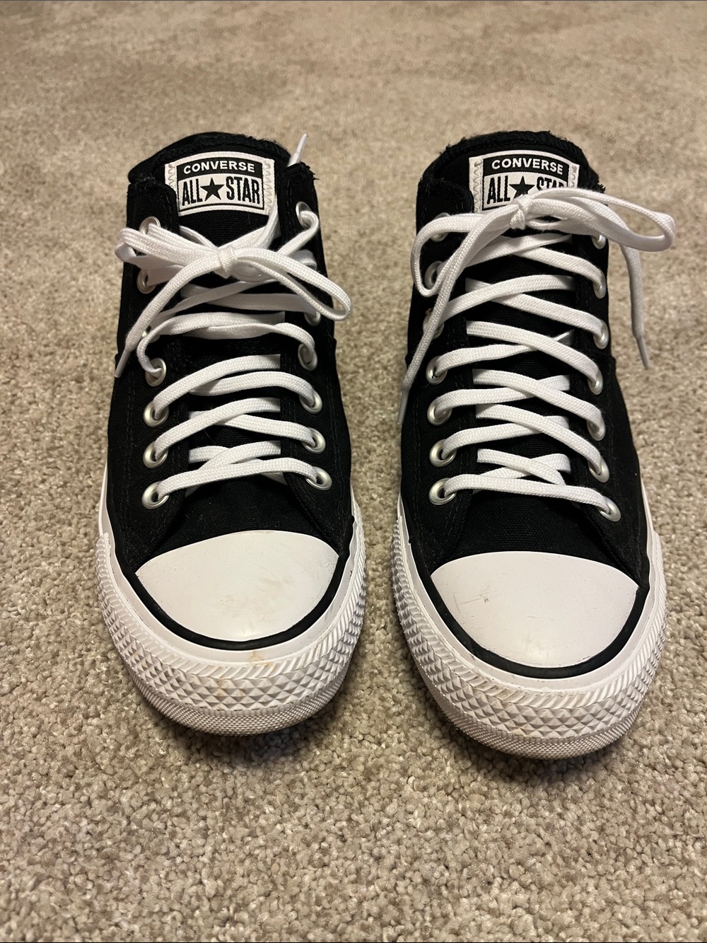 Converse Black and White High-Top Sneakers